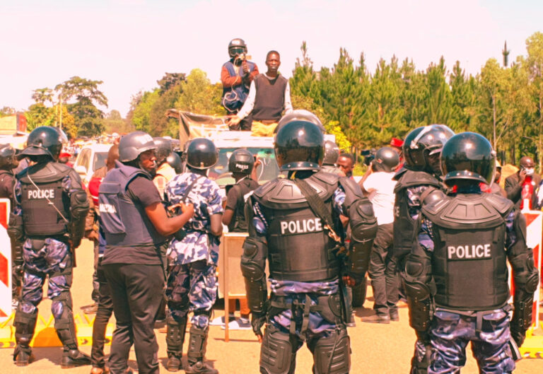 Bobi Wine is blocked by Ugandan police during his presidential campaign ahead of the 2021 general election. The image was shared on Bobi Wine's Twitter account on 11 December 2020.